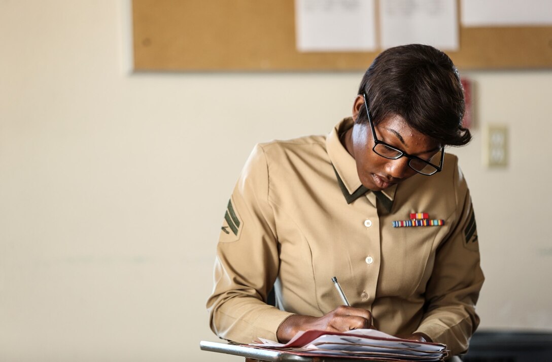 Corporal Ashton Tyler, warehouse clerk, 15th Marine Expeditionary Unit, takes notes during a lecture on being a noncommissioned at the Corporal’s Course Academy aboard Camp Pendleton, Calif., Dec. 10. The academy’s mission is to provide the Marine corporals with the education and leadership skills necessary to lead Marines. Tyler, 21, is from Charleston, S.C. (U.S. Marine Corps photo by Cpl. Emmanuel Ramos/Released)