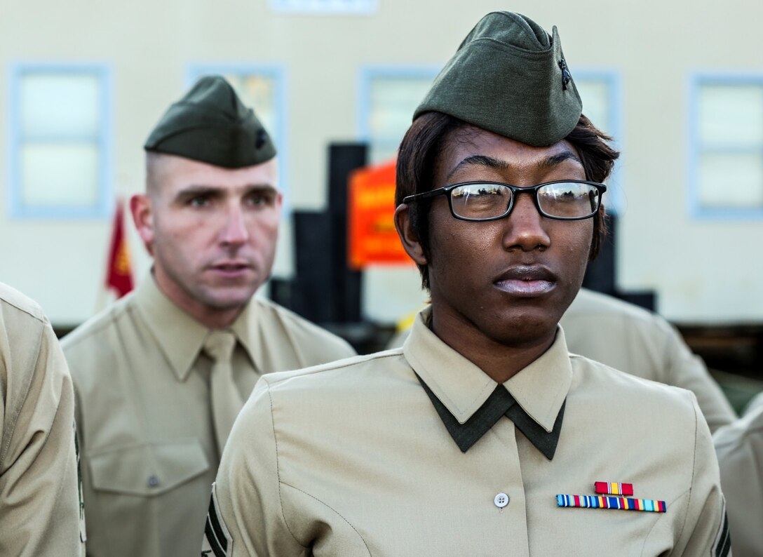 Staff Sgt. David McFadden, faculty advisor, Corporal’s Course Academy, conducts a uniform inspection on Cpl. Ashton Tyler, warehouse clerk, 15th Marine Expeditionary Unit, at the Corporal’s Course Academy aboard Camp Pendleton, Calif., Dec. 10. The academy’s mission is to provide corporals with the education and leadership skills necessary to lead Marines. McFadden, 32, is from Longview, Texas, Tyler, 21, is from Charlestown, S.C. (U.S. Marine Corps photo by Cpl. Emmanuel Ramos/Released)