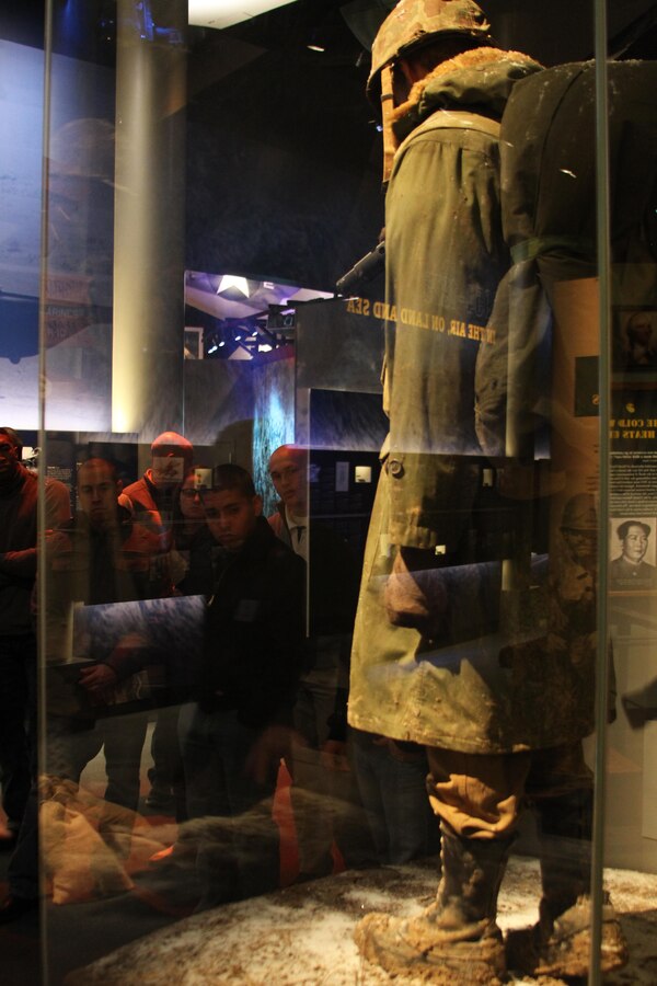 U.S. Marines from the 4th Marine Corps District look at a Korean War display at the National Museum of the Marine Corps in Triangle, Va., Dec. 12, 2013. The display is one of many at the museum detailing certain political, technological and military events of different time periods in the Marine Corps’ history. (U.S. Marine Corps photo by Lance Cpl. Tyler Birky/Released)