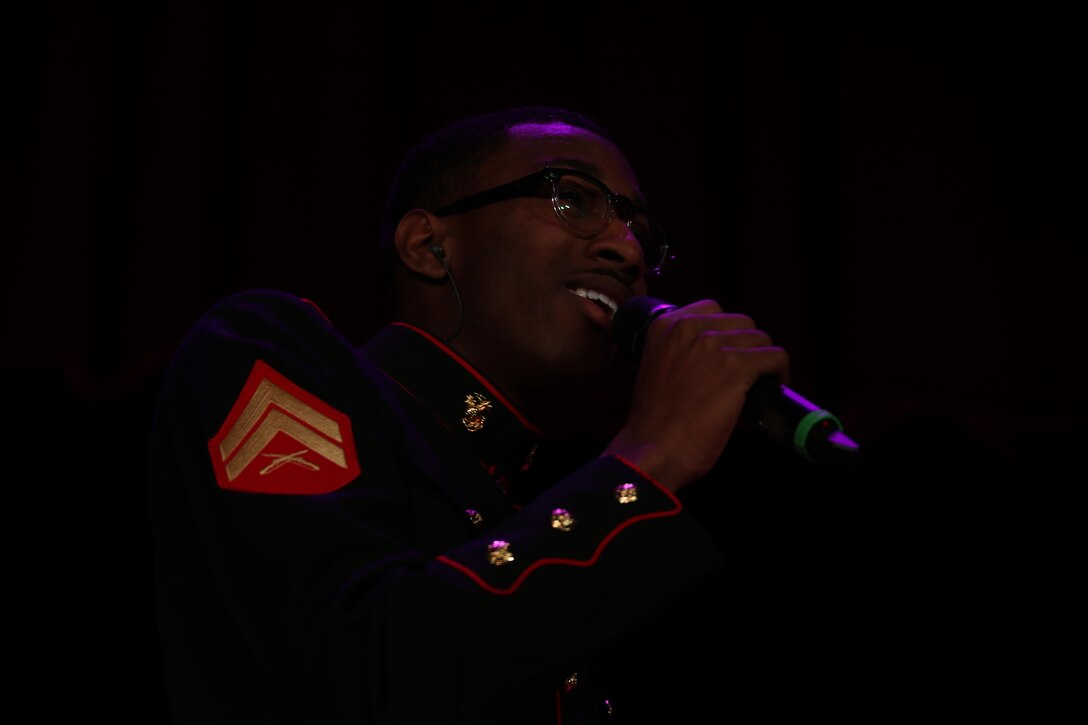 Cpl. Jerrid Robinson, clarinet player, 3rd Marine Aircraft Wing (MAW) Band, sings “This Christmas” during the 3rd MAW Band Holiday Concert aboard Marine Corps Air Station Miramar, Calif., Dec. 14. The band played a wide array of music ranging from jazz to big band.