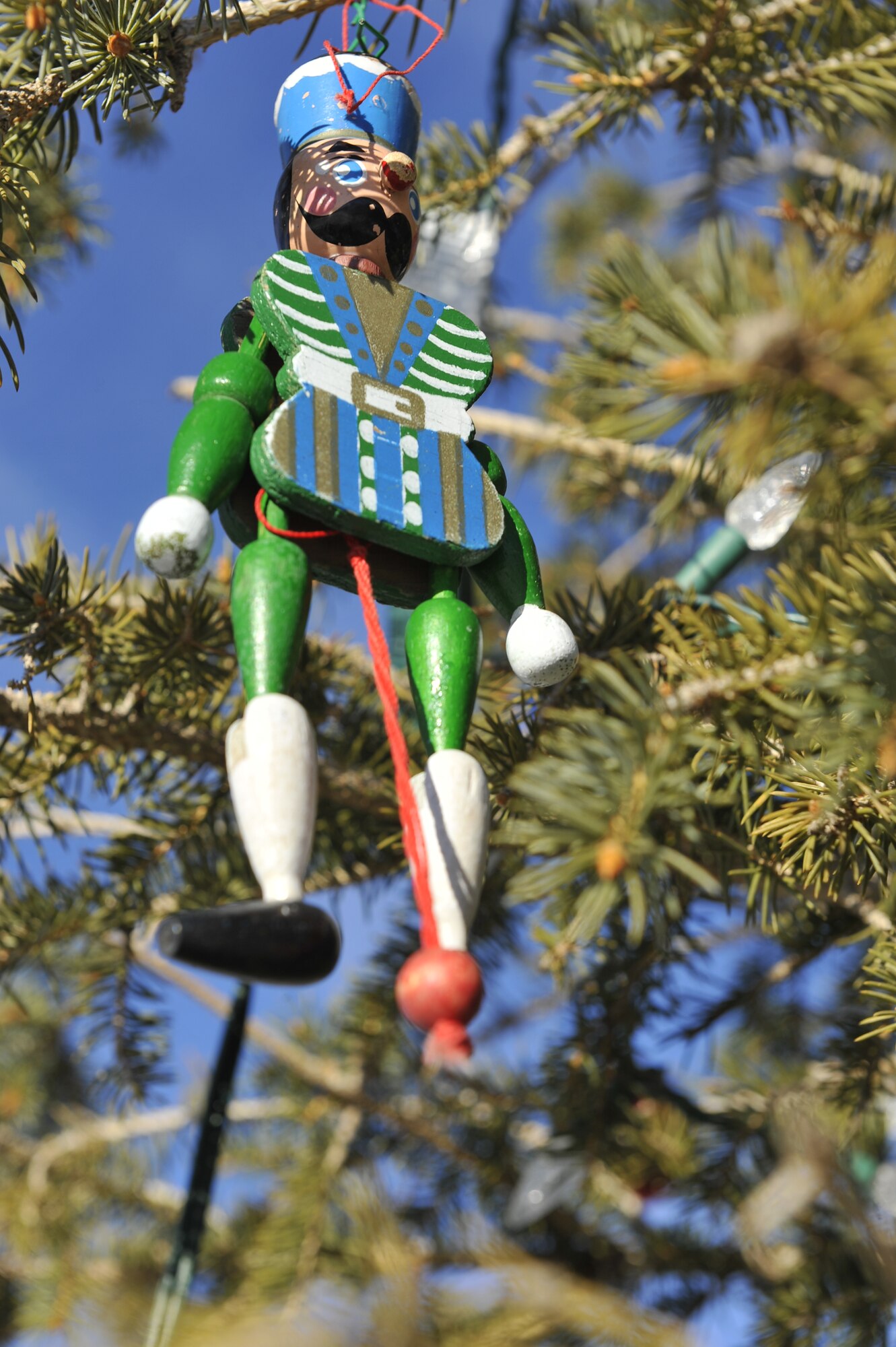 Kristopher Mansfield’s favorite ornmanet hangs from a tree decorated in his honor. Mansfield was a former 460th Space Communications Squadron member who was killed by a drunk driver. The tree is decorated every year in his memory. (U.S. Air Force photo by Airman 1st Class Samantha Saulsbury/Released)
