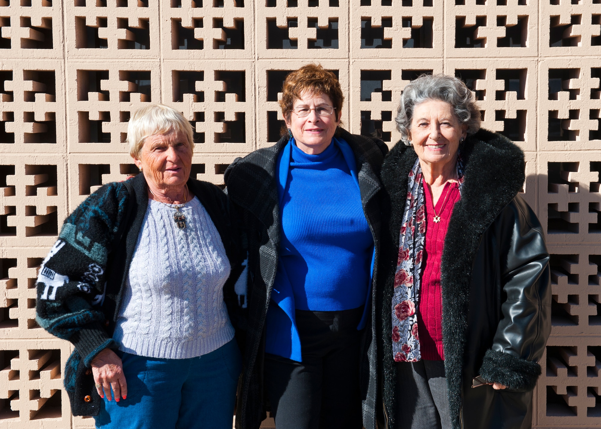 Dr. Gail Wallen (center), historian and director of the military program for the Holocaust Survivors of Southern Arizona, stands with two survivors of the Holocaust, Wanda Wolosky (left) and Lily Brull (right) at Holloman Air Force Base, N.M., Dec. 11. Wallen visited Holloman AFB with Brull and Wolosky to teach the history of Holocaust and spread an understanding of the foundational elements that led to such atrocities. (U.S. Air Force photo by Senior Airman Daniel E. F. Liddicoet/Released)