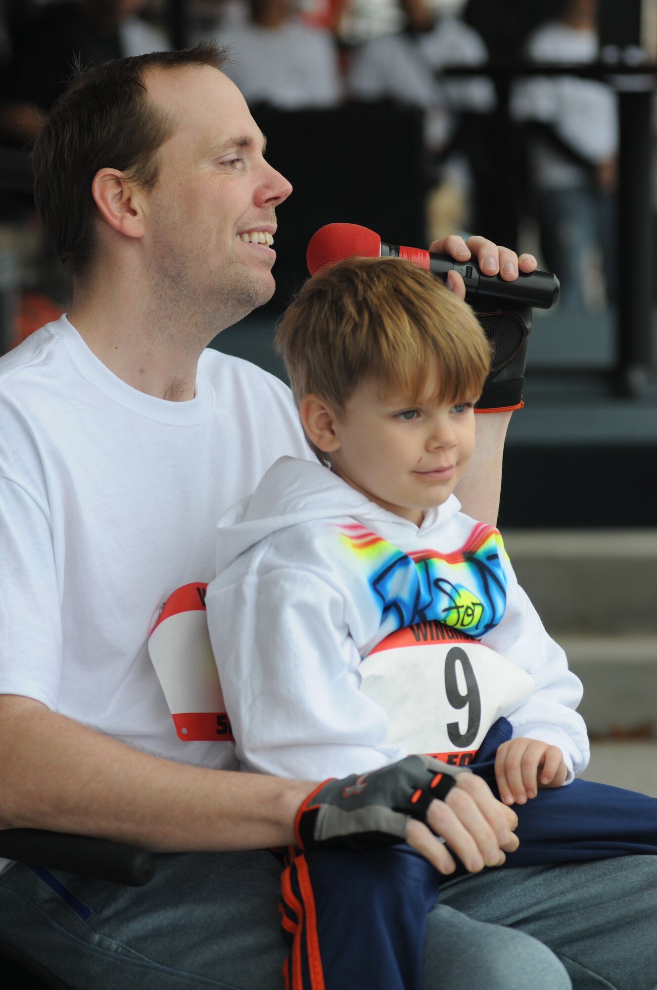 Master Sgt. Albert “AJ” Jackson, 335th Training Squadron, thanks everyone for their attendance and donations during the “5K for AJ” benefit run Dec. 14, 2013, Keesler Air Force Base, Miss. The event, organized by the 335th TRS “Bulls,” was held to raise money for AJ, who was paralyzed from a medical procedure.  (U.S. Air Force photo by Kemberly Groue)
