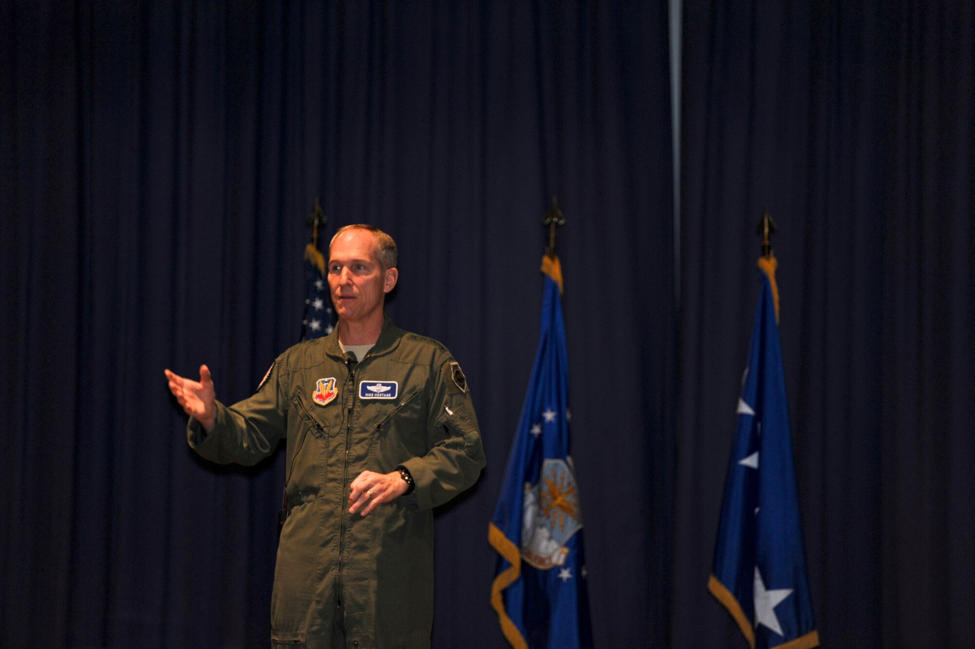 Gen. Mike Hostage, commander of Air Combat Command, spent time with the Airmen of Headquarters ACC during three all-calls at Langley Air Force Base Va., Dec. 12, 2013. Hostage urged Airmen to take a stand against sexual assault and to not tolerate behavior that makes people feel alienated or at risk. (U.S. Air Force photo by Staff Sgt. Steve Stanley/Released)