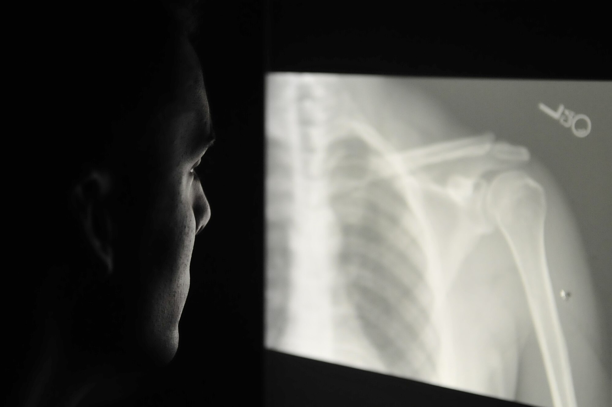 Staff Sgt. Thomas Nuckols, 436th Medical Support Squadron diagnostic imaging technologist, checks an x-ray Oct. 8, 2013, at the base medical clinic on Dover Air Force Base, Del. (U.S. Air Force photo/Airman 1st Class William Johnson)