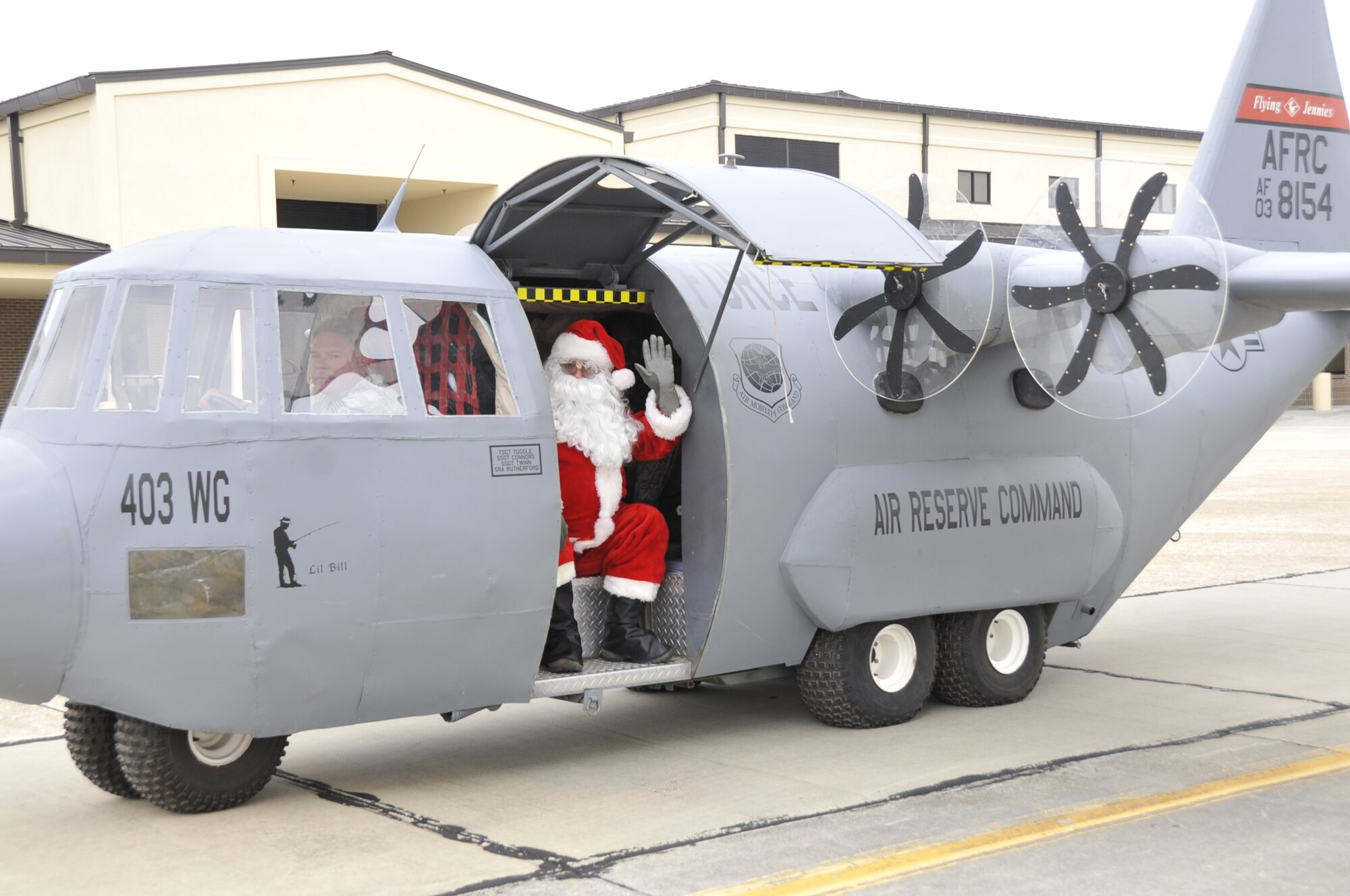 Santa Claus visited the 403rd Wing, an Air Force Reserve unit, during the Wing's Christmas Party at the Maintenance Fuel Cell from 11:30 a.m. to 1:30 p.m. Dec. 7, 2013. (U.S. Air Force photo/Master Sgt. Jessica Kendziorek)