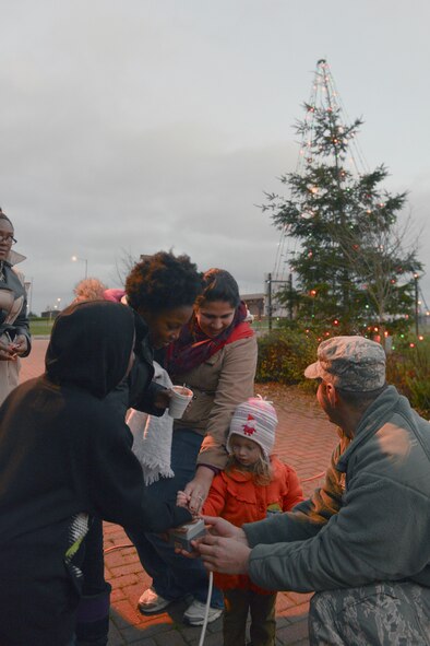 RAF CROUGHTON, United Kingdom – Family members from RAF Croughton help light the base’s Christmas tree during a tree lighting ceremony Dec.6. The tree lighting was held in front of the RAF Croughton Chapel and included a visit from Santa. (U.S. Air Force photo by Tech. Sgt. Chrissy Best)