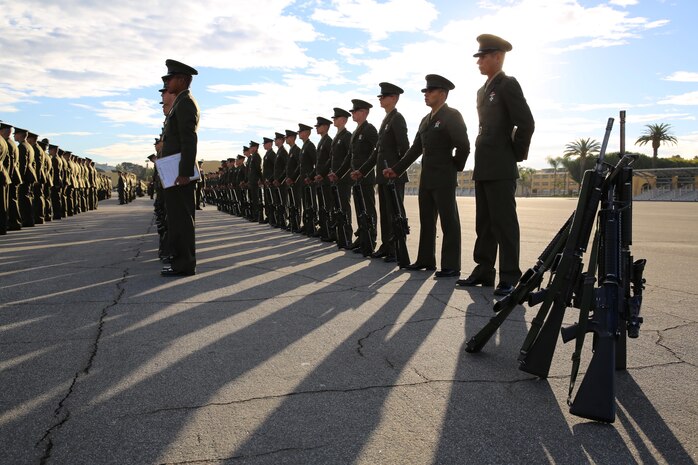 Marines of Company M, 3rd Recruit Training Battalion, stand strong during their Battalion Commander's Inspection aboard Marine Corps Recruit Depot San Diego, Dec. 10.  During the inspection, Co. M Marines were asked various questions ranging from uniform regulations, Marine Corps knowledge and history, rank structure and why they joined.