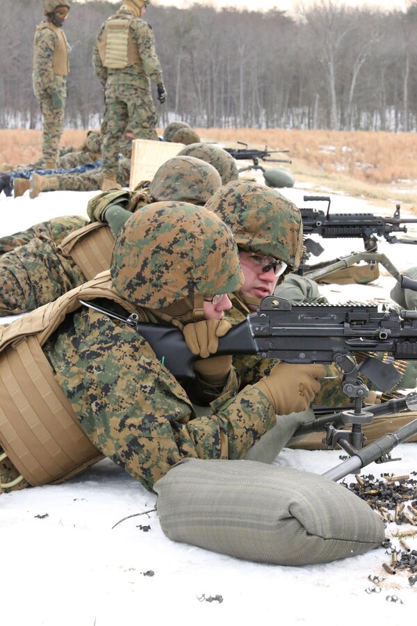 Marines fire M249 Squad Automatic Weapons at Range 14 on Dec. 11, 2013, during a training event. The Marines also fired M240B machine guns during the live fire.