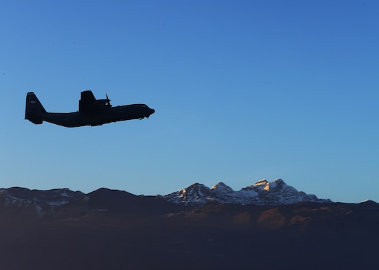 A C-130 Hercules takes off from the flightline carrying both Army and Air Force paratroopers, Dec. 11, 2013, at Aviano Air Base, Italy. The Hercules is the prime transport for airdropping troops and equipment into hostile areas.