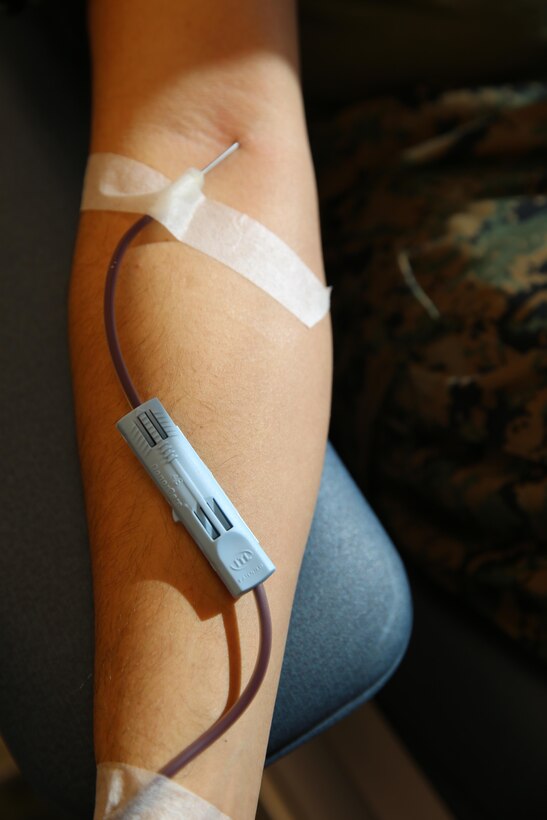 Marines aboard Marine Corps Air Station Miramar, Calif., donate blood at the Miramar Milcon Clubhouse for the Naval Medical Center San Diego, Dec. 17. Participants in the blood drive were also urged to donate platelets in the future, which are needed in procedures such as cancer treatment.