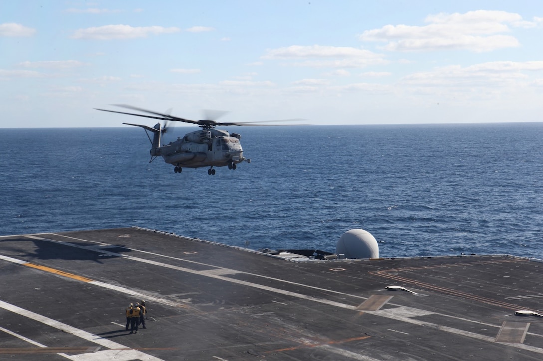 Marines with Marine Heavy Helicopter Squadron 361 depart the USS Ronald Reagan off the coast of San Diego, Calif., Dec. 6. Marines flew from Camp Pendleton to the aircraft carrier to conduct rotary wing operations.