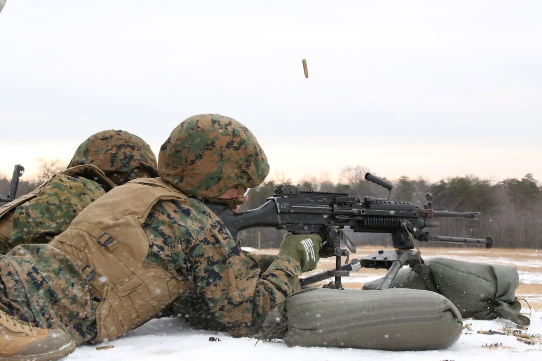 Marines fire M249B Squad Automatic Weapons at Range 14 aboard Marine Corps Base Quantico, on Dec. 11, 2013. The unit also fired M240B machine guns during the event.