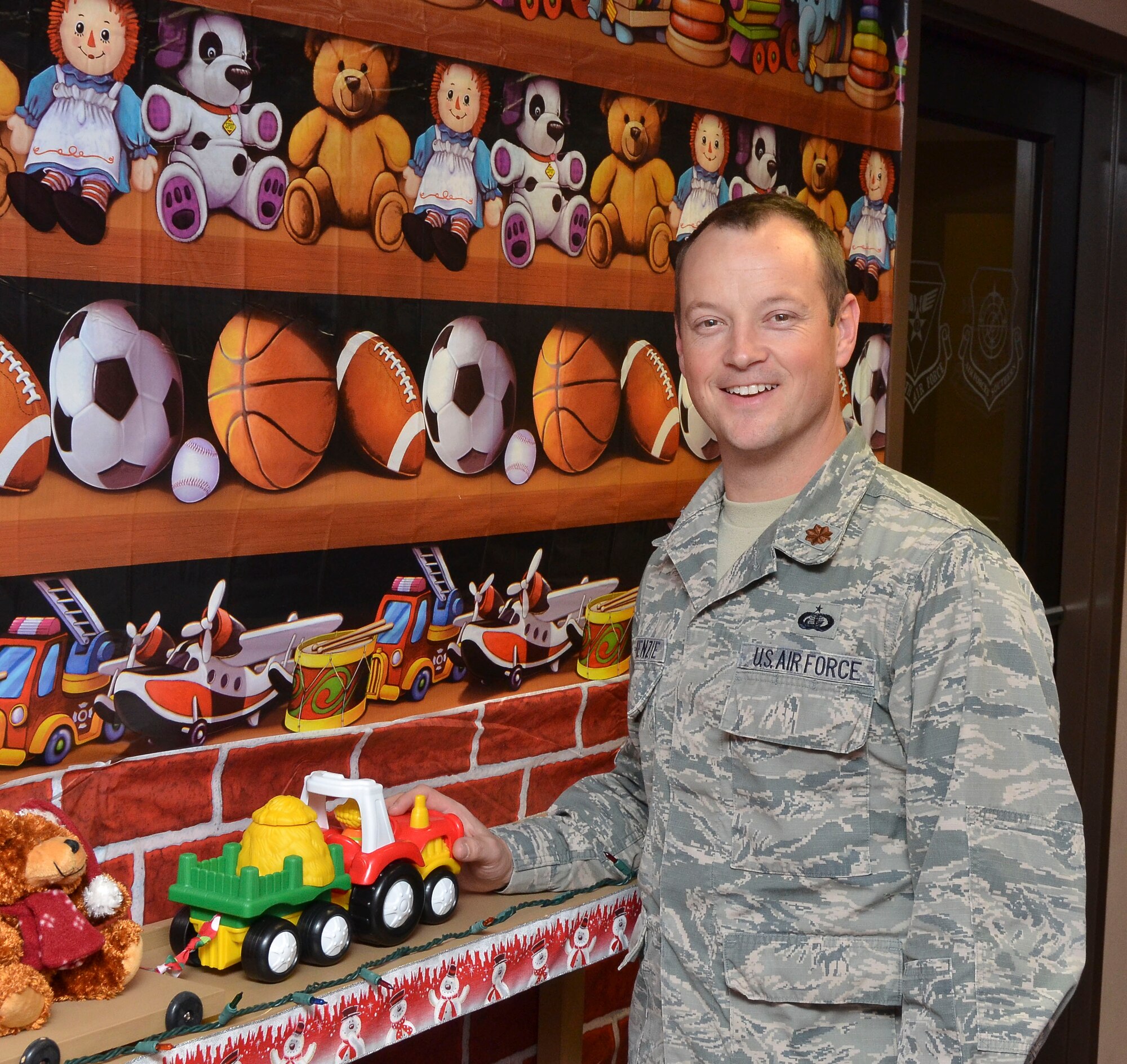 Major Michael Mckenzie, 12th Air Force (Air Forces Southern) chief of protocol, “this holiday season I am thankful for my son Adam and my wife Madeleine. They are the light that guides me along though my journey through life." (U.S. Air Force photo by Staff Sgt. Adam Grant/Released)   