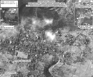 An RQ-4 Global Hawk captures messages of distress constructed on rooftops and roads in this image taken by the high altitude reconnaissance platform flying in support of Operation Damayan over regions of the Philippines devastated byTyphoon Haiyan last month. A 13th Reconnaissance Squadron reservist performed sensor operator duties on this humanitarian mission, alongside active duty members of the 12th Reconnaissance Squadron who fly the remotely piloted aircraft from Beale Air Force Base, Calif. (U.S. Air Force photo/Released) 