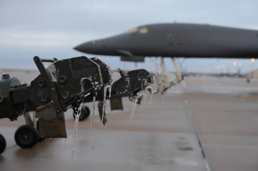 Towing equipment for the B-1B Lancer was covered in ice by wintry weather Nov. 25, 2013, at Dyess Air Force Base, Texas. Safety officials advise not to drive if there is inclement weather during the holidays. Drivers are encouraged to check the weather ahead of time and avoiding traveling during icy conditions. (U.S. Air Force photo by Airman 1st Class Alexander Guerrero/Released)