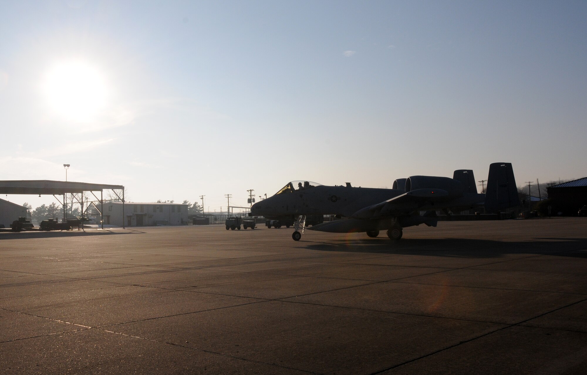 Col. Michael Stohler, a pilot with the Indiana Air National Guard's 122nd Fighter Wing, taxis on the ramp at Ebbing Air National Guard Base, Fort Smith, Ark., Dec. 11, 2013, preparing to deliver an A-10C Thunderbolt II "Warthog" from the 188th Fighter Wing to the 122nd. Tail Nos. 659 and 626 are bound for Fort Wayne, Ind., as part of the 188th’s on-going conversion from a fighter mission to remotely piloted aircraft and Intelligence mission, which will include a space-focused targeting squadron. (U.S. Air National Guard photo by Senior Airman John Hillier/188th Fighter Wing Public Affairs)