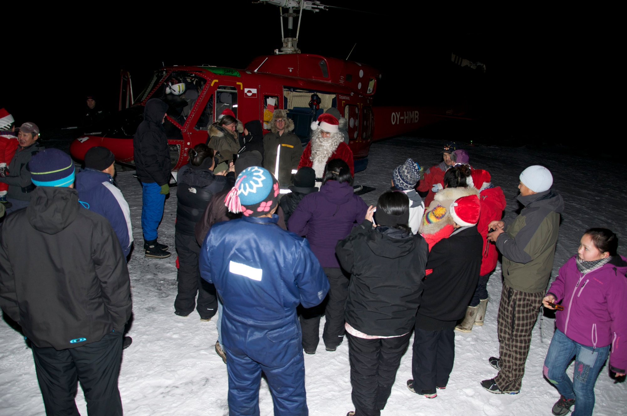 SAVISSIVIK, Greenland -- Julemand arrives at Savissivik, Greenland, for Thule Air Base’s Operation Julemand. The multi-national effort is held annually by U.S., Danish and Canadian military and civilian employees at Thule to promote goodwill with the Greenlandic people. Julemand is Danish for “Christmas Man” and is the equivalent to Santa Claus. (U.S. Air Force photo/Capt. Laura Simmons)