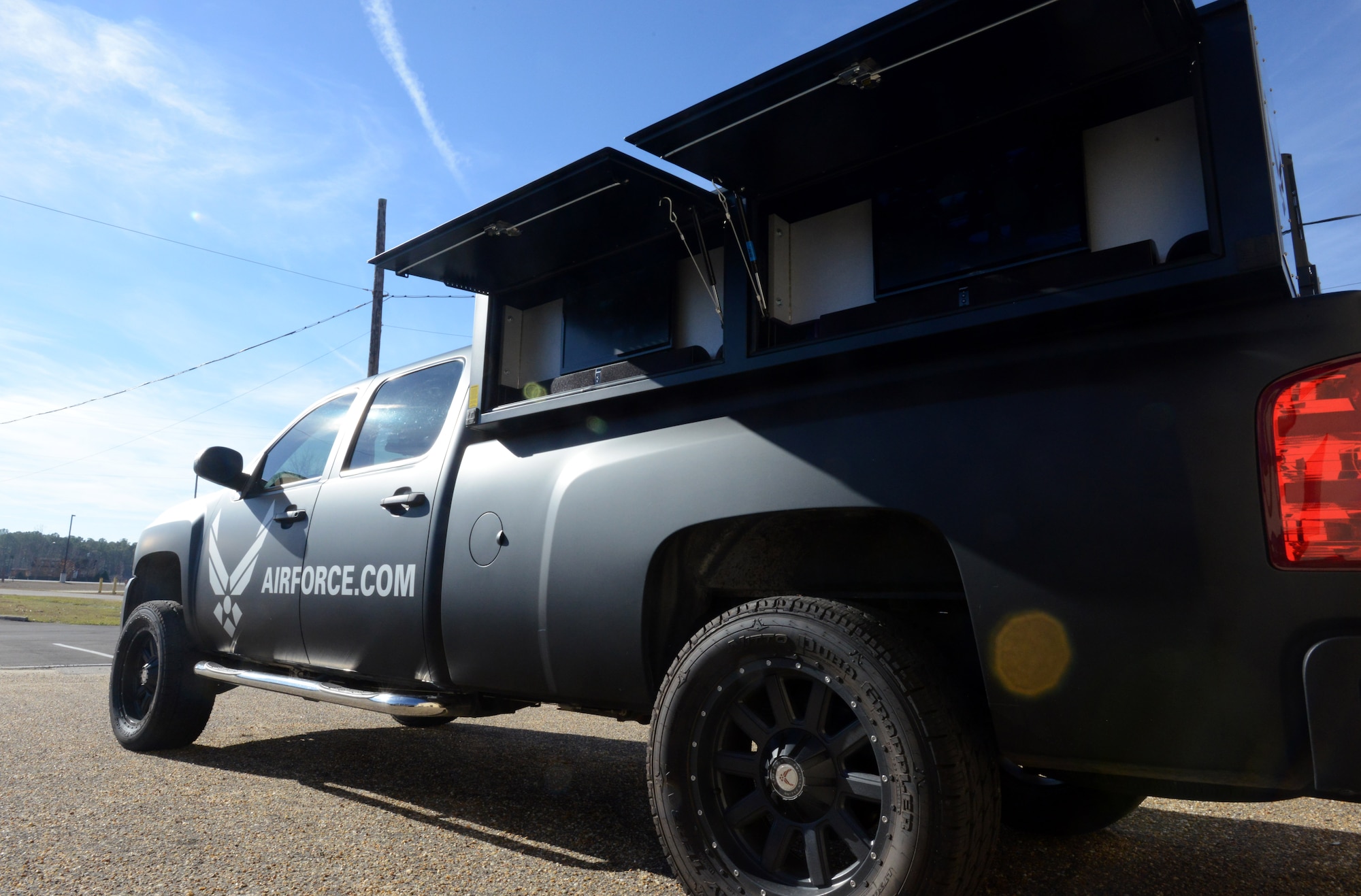 The 337th Recruiting Squadron’s recently upgraded Chevrolet Silverado 2500 was designed to reflect the “Battlefield Airman” concept Dec. 13, 2013, at Shaw Air Force Base, S.C. A main upgrade is the in-bed entertainment console which features TVs, game consoles and a public address system. (U.S. Air Force photo by Senior Airman Laura L. ValentineReleased)