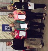 Navy Capt. Timothy Sparks, Joint Base Charleston deputy commander, and Beth Munoz, Navy Exchange general manager (right), congratulate Teresa Patterson, Pam Linn and Sharon Guerra during the Navy Exchange’s annual Christmas Award Appreciation Luncheon Dec. 17, 2013, at Joint Base Charleston – Weapons Station. Patterson, Linn and Guerra received the Superior Accomplishment Recognition awards for their work. (U.S. Navy photo/April Ware) 

