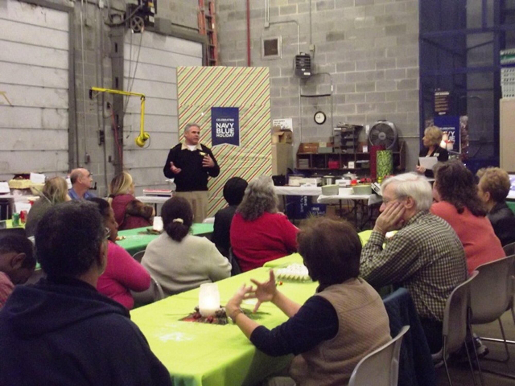 Capt. Timothy Sparks, Joint Base Charleston deputy commander, thanks Navy Exchange employees during their annual Christmas Award Appreciation Luncheon Dec. 17, 2013, at Joint Base Charleston – Weapons Station. Sparks handed out several awards during the luncheon and joined the NEX employees for a buffet lunch.  (U.S. Navy photo/April Ware)
