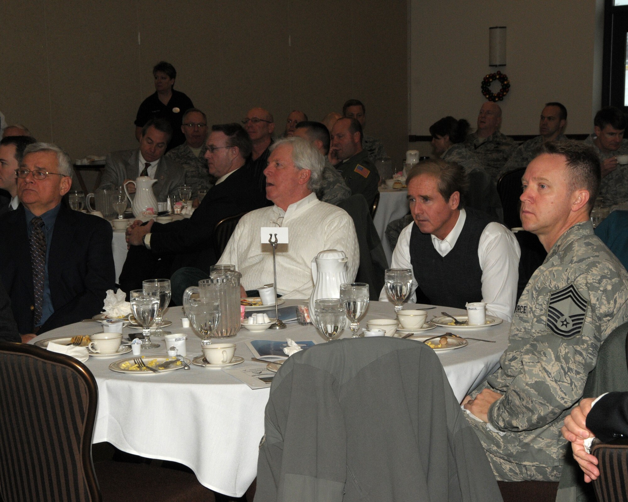 Local, state and federal legislative and or staff members as well as other local leaders and retired military receive a mission briefing by Commanders of the 914th and 107th Airlift Wings at the Niagara Falls Air Reserve Station on December 17, 2013. In addition to the mission brief the members received a legislative update by the Niagara Military Affairs Council and a brief tour of the base facilities and a C-130 aircraft. The Niagara Falls Air Reserve Station is home to the 914th and 107th Airlift Wings, the Military Entrance Processing Station and Army Reserve and National Guard units.  The base employs over 3,500 personnel and is indirectly responsible for creating hundreds of jobs in western New York. (U.S. Air Force photo by Peter Borys)