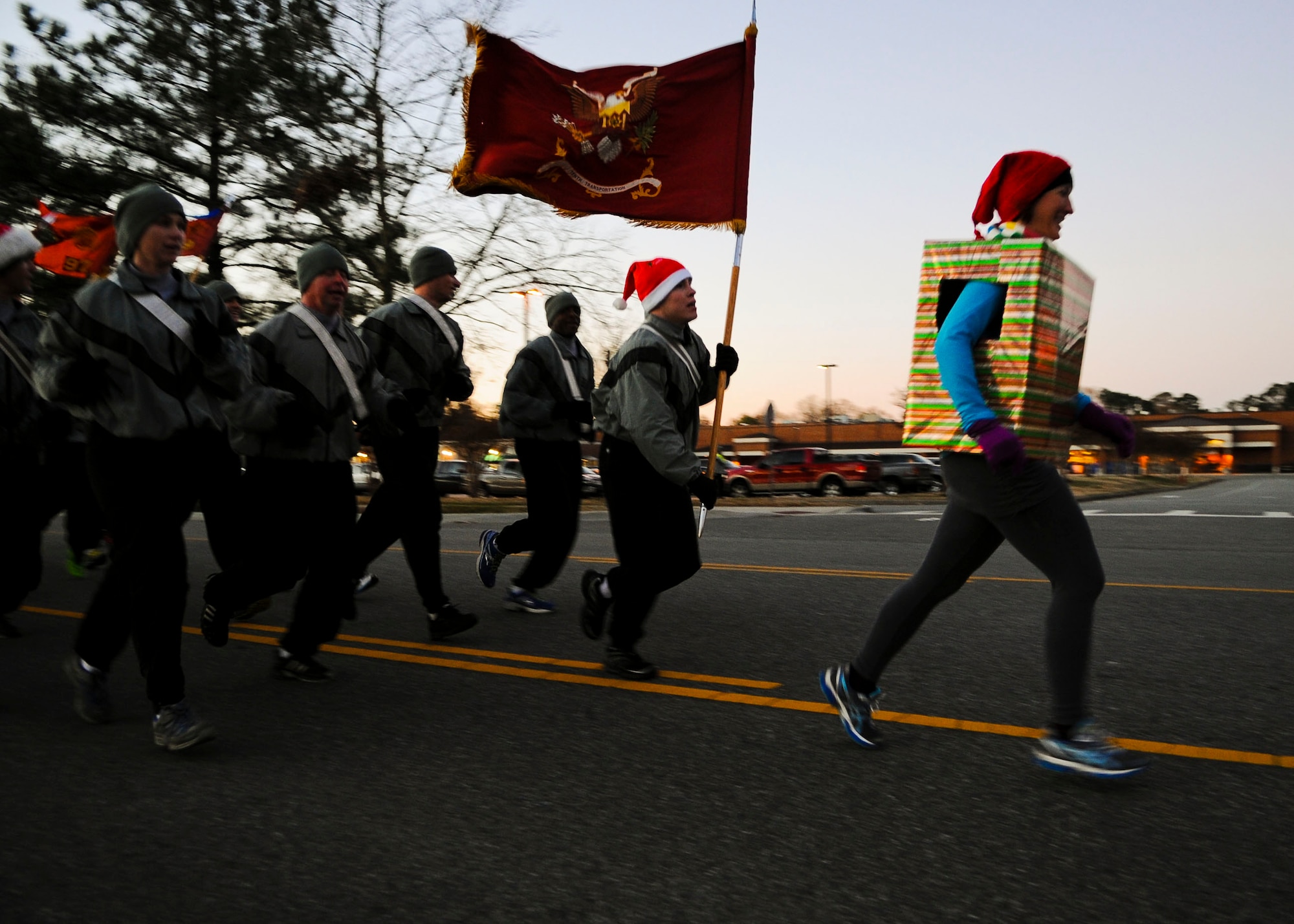 U.S. Army Soldiers show their holiday spirit during the Reindeer Run at Fort Eustis, Va., Dec. 13, 2013. The Soldiers wore festive gear during the event to usher in the spirit of the holiday season. (U.S. Air Force photo by Airman 1st Class Austin Harvill/Released)