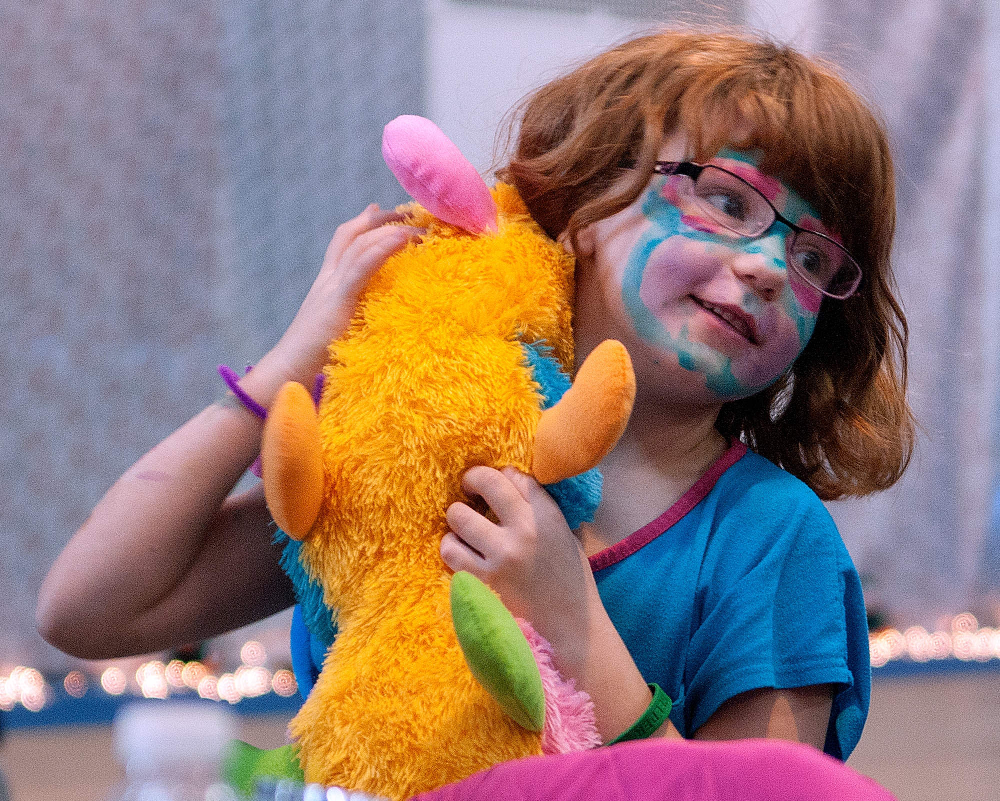 Topanga Murrels, 6, hugs a stuffed toy she got from Santa Claus Dec. 14, 2014. Murrels was one of the local Cheyenne, Wyo., children who visited F.E. Warren Air Force Base to take part in Operation Provide Joy. (U.S. Air Force photo by R.J. Oriez)