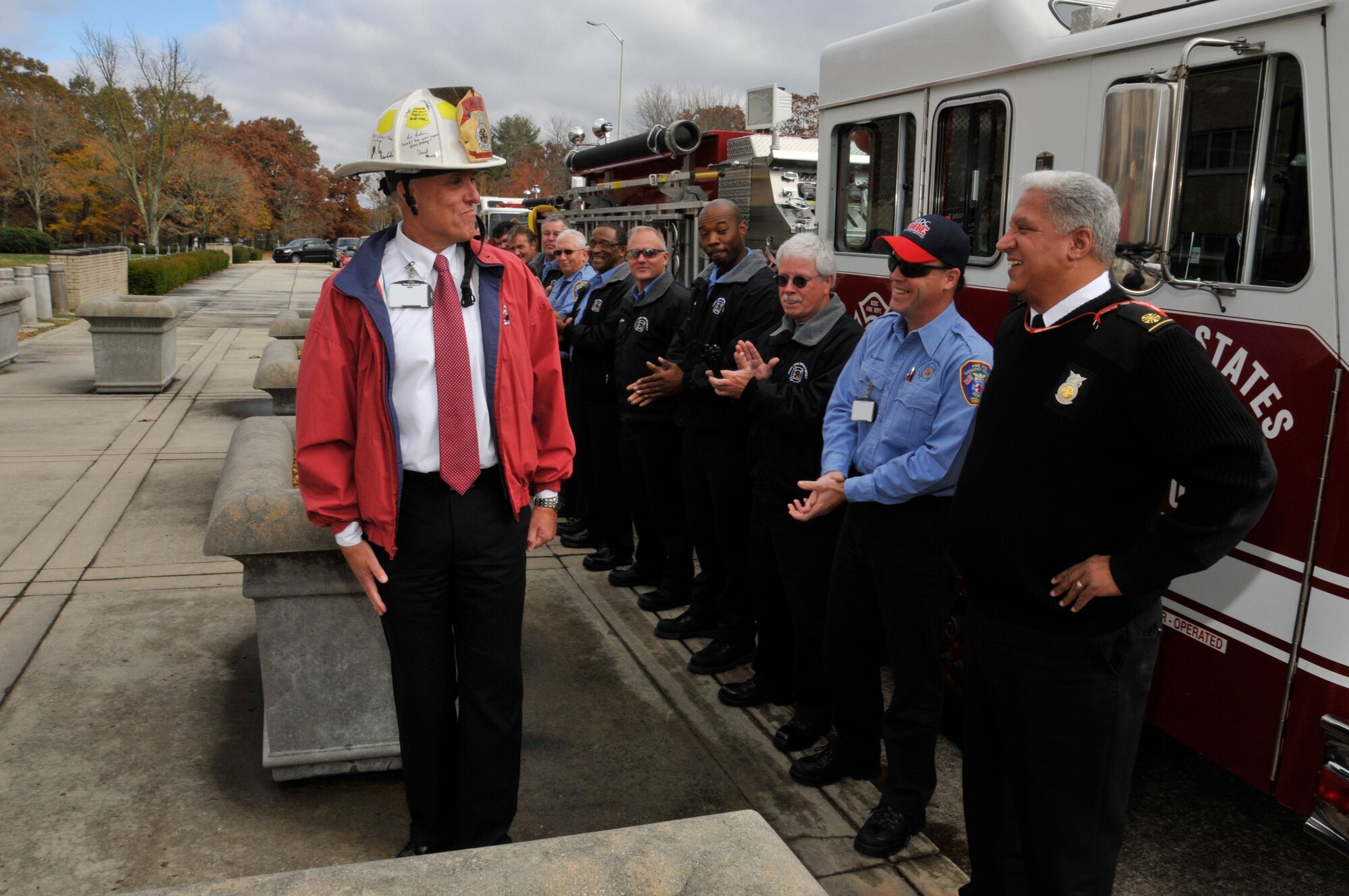 On the occasion of John Sutton's retirement, AEDC Fire Chief Daryle Lopes and the B-shift firefighters made Sutton an honorary AEDC Fire Chief for the Day.  This fulfilled a childhood dream Sutton had harbored since grade school when a local fire department visited his school.  After the presentation, driver/operator Ken Locker took Sutton for a brief ride in Engine One. Pictured are Sutton standing tall in the chief’s hat, Chief Lopes (far right), Locker (standing by Lopes) and the B-shift team. (Photo by Rick Goodfriend)