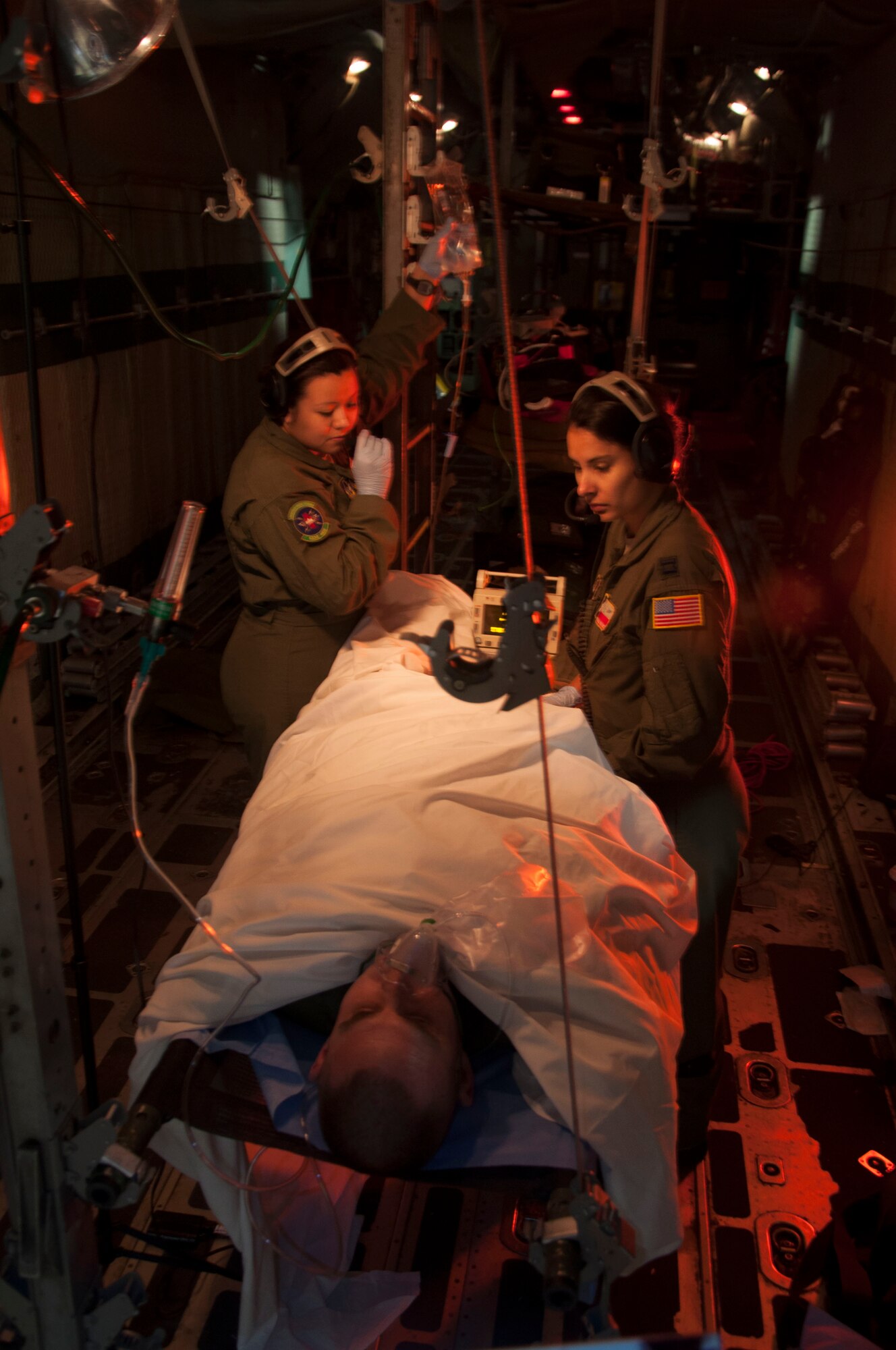 Artist, Maj. Warren Neary, an Air Force Space Command Individual Mobilization Augmentee and historian, was commissioned by the Air Force Reserve Command’s History Office to paint Capt. Adriana Valadez and SSgt Amanda Pena, both from the 433rd Aeromedical Squadron, Joint Base San Antonio-Lackland,Texas. Both Valadez and Pena, played pivotal roles in saving Air Force Combat Controller, Tech, Sgt. Zach Rhyner, who had been severely wounded on a battlefield in northern Afghanistan, back in late March 2013. (Courtesy photo/ Maj. Warren Neary)