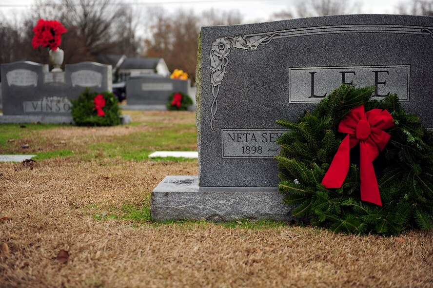 Airmen from Seymour Johnson Air Force Base, N.C., and members of the Goldsboro community took time to honor veterans during a wreath-laying ceremony at Evergreen Memorial Cemetery, Goldsboro, N.C., Dec. 14, 2013.  The event was part of the Wreaths Across America mission, which delivered more than 540,000 remembrance wreaths to 908 cemeteries across the country in honor of our nation’s veterans.  (U.S. Air Force photo by Airman 1st Class Brittain Crolley)