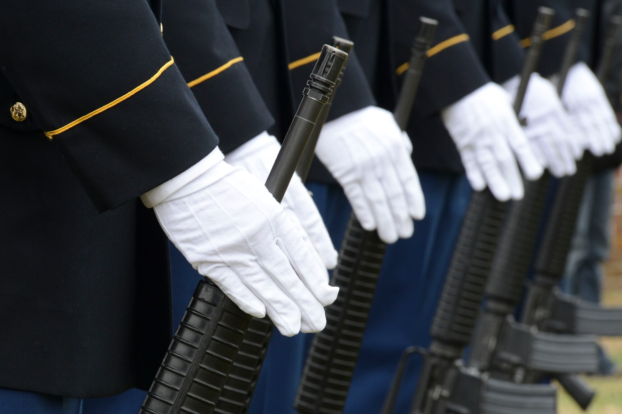 U.S. Army Soldiers prepare for the start of a wreath-laying ceremony at Yorktown National Cemetery in Yorktown, Va., Dec. 14, 2013. The ceremony honored National Wreaths Across America Day, a remembrance observation honoring veterans and Service members and their sacrifices for their country. (U.S. Air Force photo by Staff Sgt. Ciara Wymbs/Released)