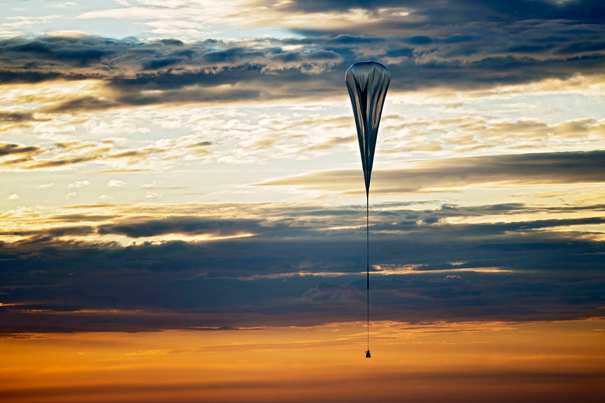 The balloon lifts up during the second manned test flight for Red Bull Stratos in Roswell, N.M., on July 25, 2012. Red Bull Stratos is a mission to the edge of space to an altitude of 37.000 meters to break several records, including the sound of speed in freefall. The Red Bull Stratos exhibit will be on display at the National Museum of the U.S. Air Force from Jan. 24-March 16, 2014. (Photo courtesy of Red Bull Stratos)
