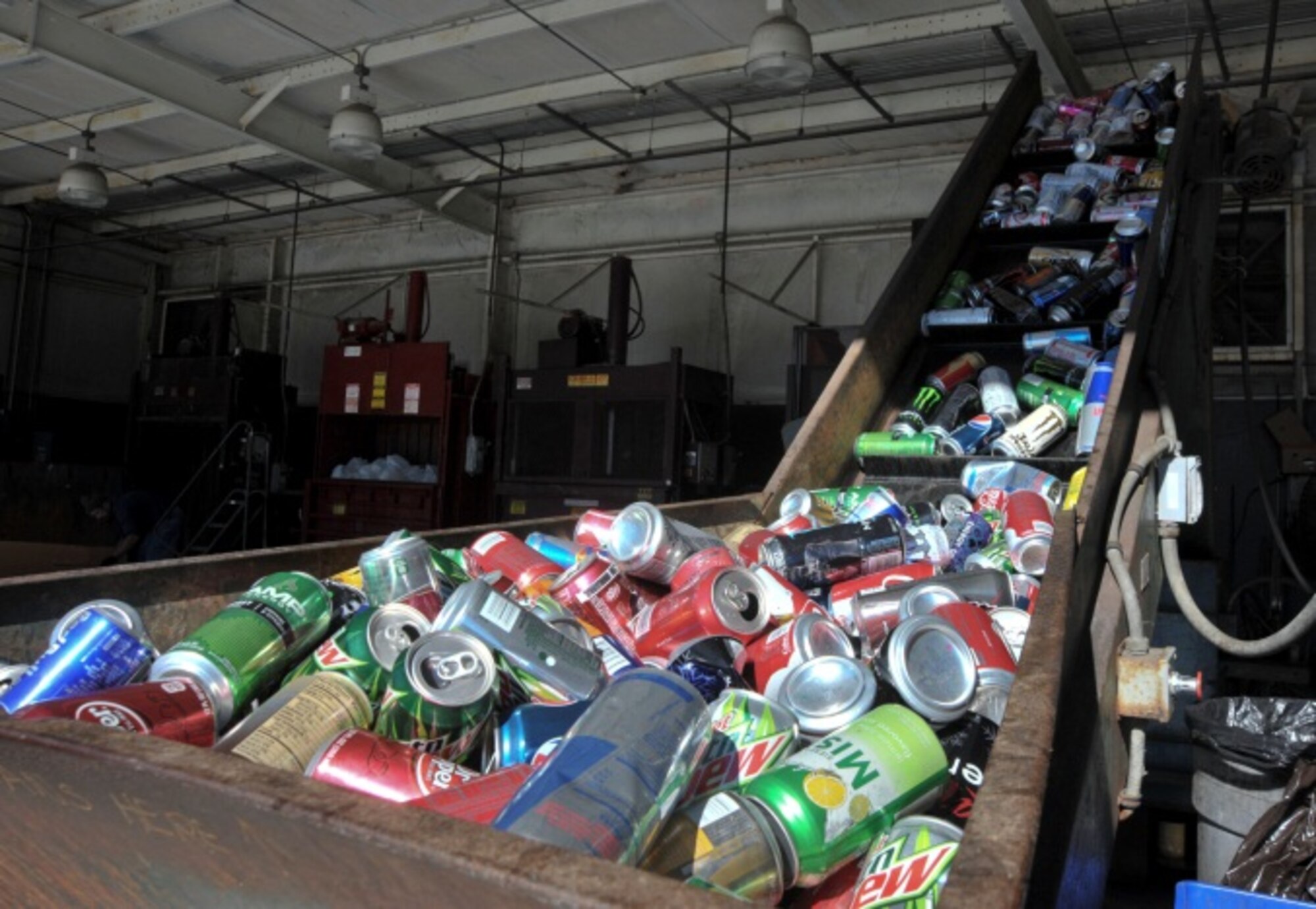 Aluminum cans await processing at the recycling center on Hurlburt Field, Fla., Dec. 12, 2013. These cans were crushed, sold and converted into new cans. (U.S. Air Force photo/Airman 1st Class Andrea Posey)