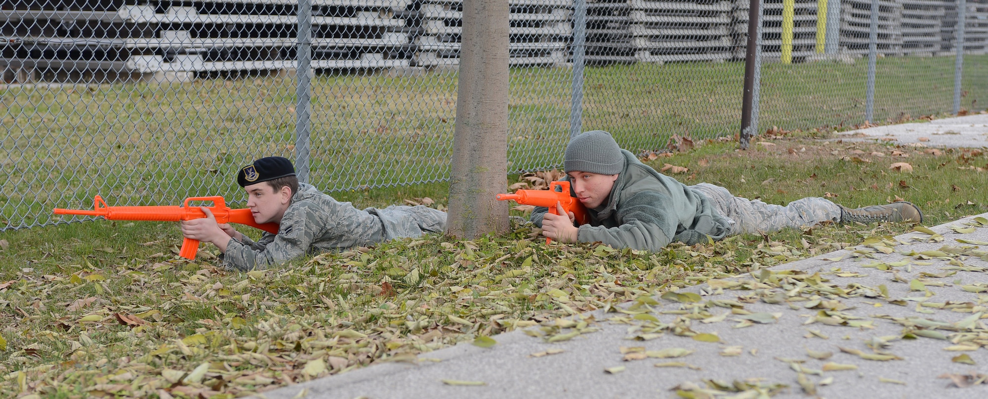 Airmen 1st Class Calvin Firster and David Pahlic, 31st Security Forces Squadron defenders, participate in close air support training exercise, Dec. 9, 2013, at Aviano Air Base, Italy. The two week CAS training allowed pilots and Airmen to work with joint terminal attack controllers who called in simulated air strikes. (U.S. Air Force photo/ Airman 1st Class Deana Heitzman)   