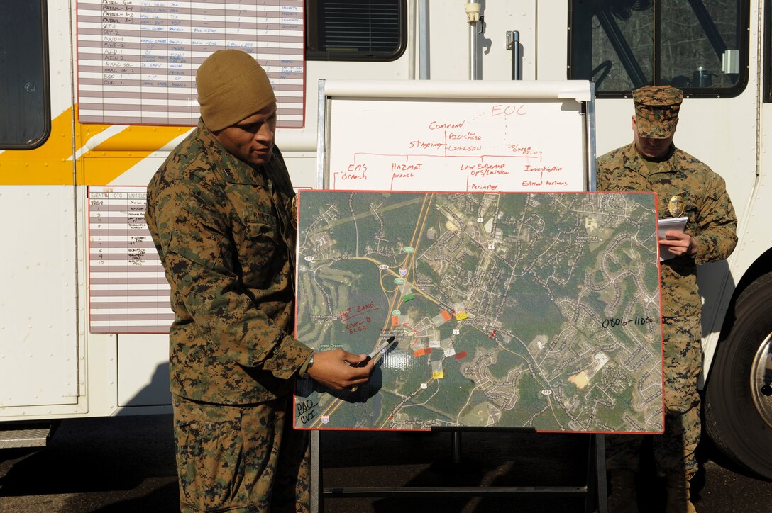 Law enforcement agencies, U.S. Marines and civilian coordinators conduct a Unified Command Functional Exercise at Marine Corps Base Quantico on Dec. 11, 2013. The exercise simulates the command response to a hostile situation at the National Museum of the Marine Corps. 