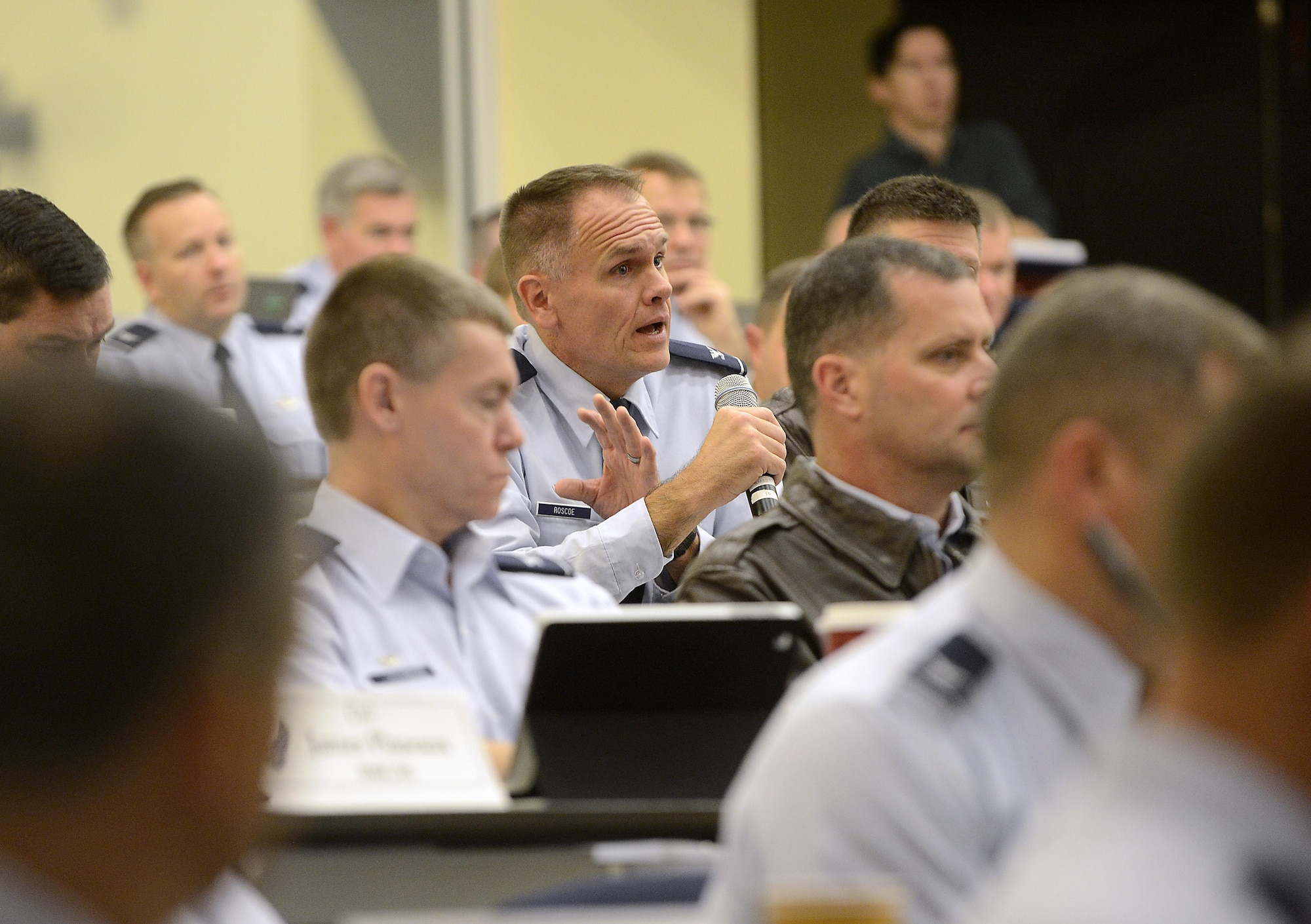 Col. John. J. Roscoe, commander of the 15ht Wing at Joint Base Pearl Harbor-Hickam, discusses his local program during the Sexual Assault Prevention summit, hosted by Air Force Chief of Staff Gen. Mark A. Welsh III, at Joint Base Andrews, Md., Dec. 12, 2013.  Wing commanders, command chiefs and sexual assault response coordinators from across the Air Force attended the two-day event, which included discussion from senior leaders, sexual assault victims and industry experts. 