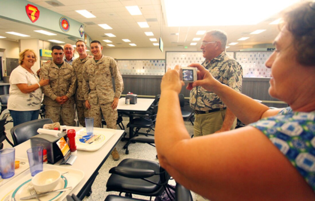 Tour participants often mingle with Marines and sailors during lunch at one of the Combat Center's dining facilities. Many take photos to remember the moment.