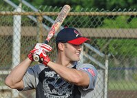 A Joint Base Pearl Harbor-Hickam servicemember prepares to take a swing while batting during the 2nd Annual Super Draft Softball Tournament, at Joint Base Pearl Harbor-Hickam, Hawaii, Dec. 14, 2013. The JBPHH Air Force Sergeant’s Association hosted the event where all the registration fees collected were donated to the Wounded Warrior Project and all the participants also donated a toy to “Toys for Tots.”  (U.S. Air Force photo/Master Sgt. Jerome S. Tayborn)