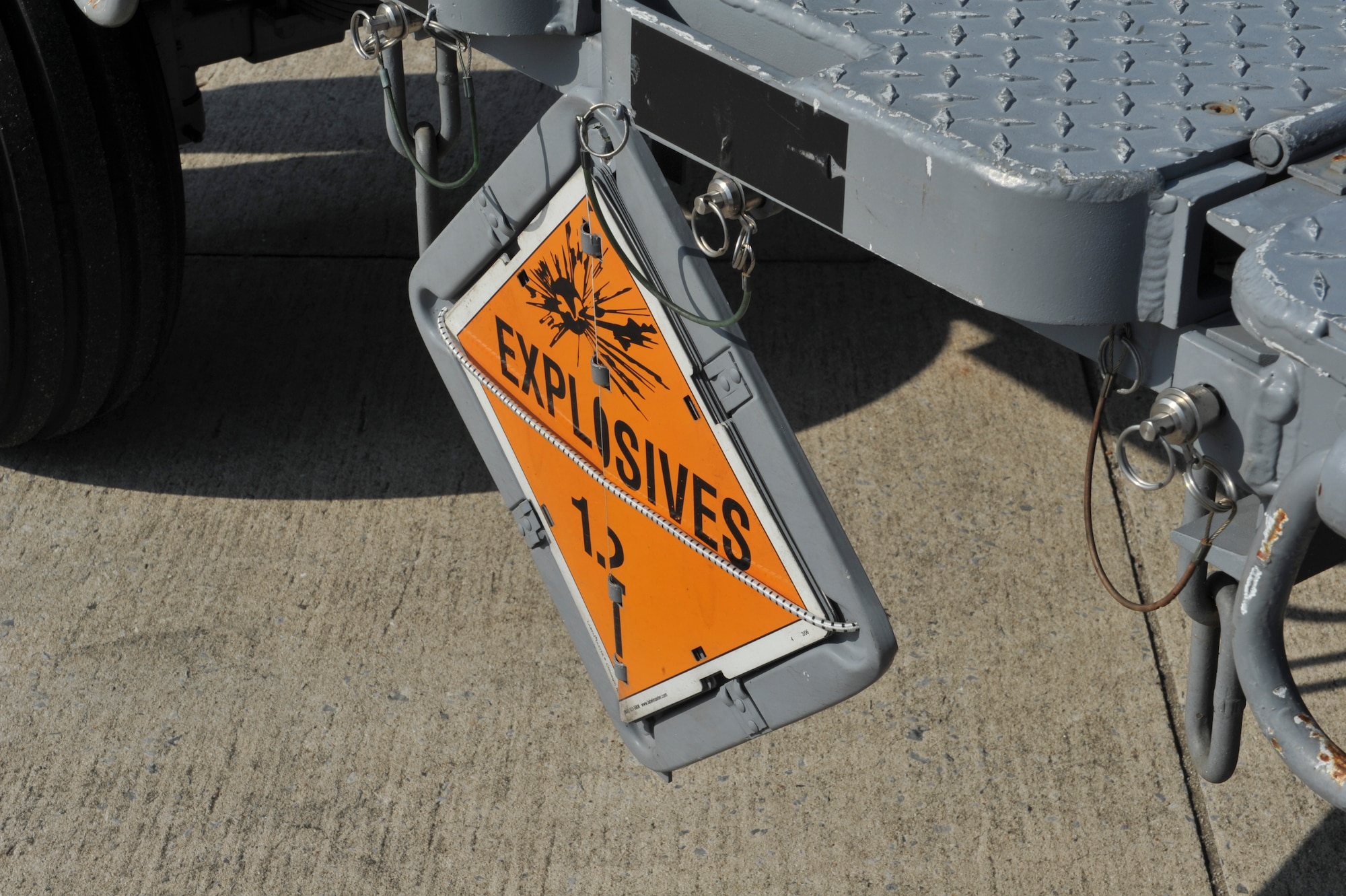 A munitions trailer displays an explosives sign on Hurlburt Field, Fla., Dec. 6, 2013. The sign is displayed to warn personnel of its explosive contents.
(U.S. Air Force photo/Staff Sgt. John Bainter