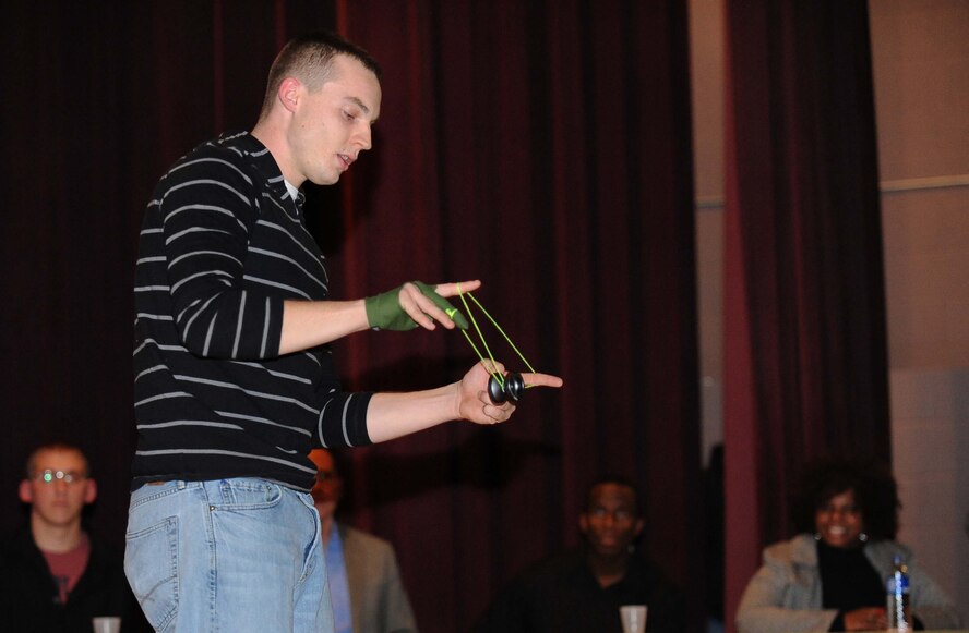 Minot Air Force Base hosted its first base-wide talent show at the base theater here Friday, Dec. 13, 2013. The show consisted of eight acts, including singing, dancing, spoken word, and yo-yoing. The judging panel, which included CMSgt Kevin Jurgella, command chief of the 5th Bomb Wing and CMSgt Felicia Noil, command chief for the 91st Missile Wing, judged each act and gave their critiques. Of the eight performances, first, second, and third place were awarded to three competitors, each with a monetary prize.  (U.S. Air Force photos/ Airman 1st Class Lauren Pitts)