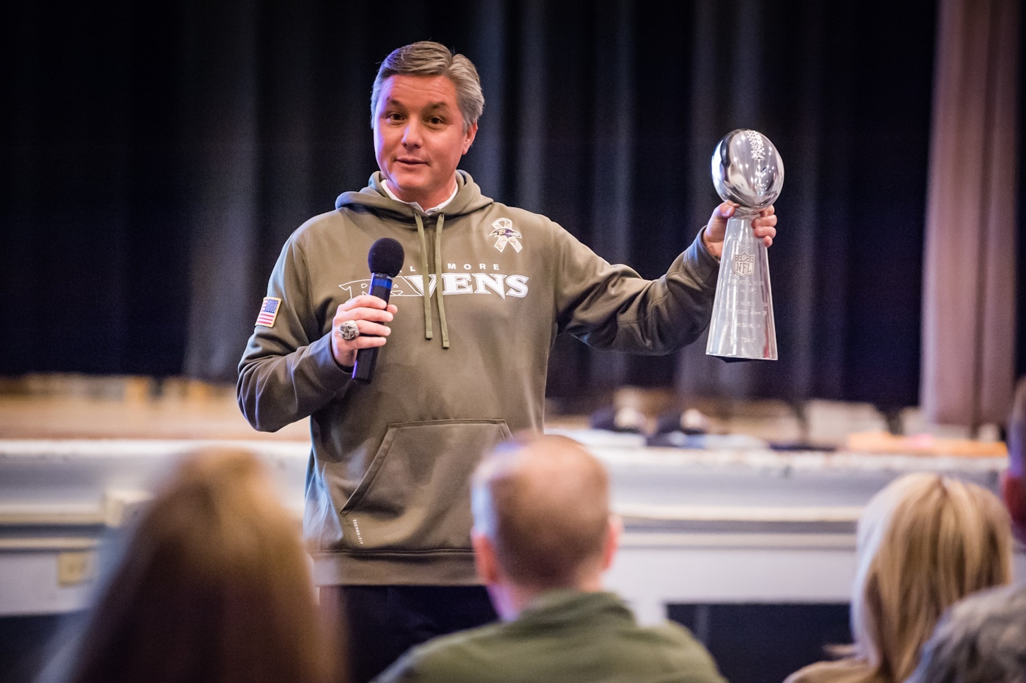 Randy Brown, Evesham Township mayor, speaks at the Timmermann Center Dec. 6, 2013, at Joint Base McGuire-Dix-Lakehurst, N.J. Brown, Baltimore Ravens kicking coach, was an integral part of the Ravens winning Super Bowl XLV11 in 2012. Brown spoke to the JB MDL community on the key points of teamwork. (U.S. Air Force photo by Russ Meseroll/Released)