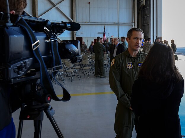 Col. James Fontanella, 315th Airlift Wing commander, answers questions during an interview at the Aircraft 9192’s 20,000 Flight Hours ceremony, December 18, 2013 at Joint Base Charleston – Air Base, S.C. The aircraft, nicknamed the “Spirit of Charleston” was the first C-17 in the U.S. Air Force’s inventory and has flown missions throughout the world for more than two decades. Those missions have totaled more than 20,000 flight hours. (U.S. Air Force photo/Staff Sgt. Anthony Hyatt)