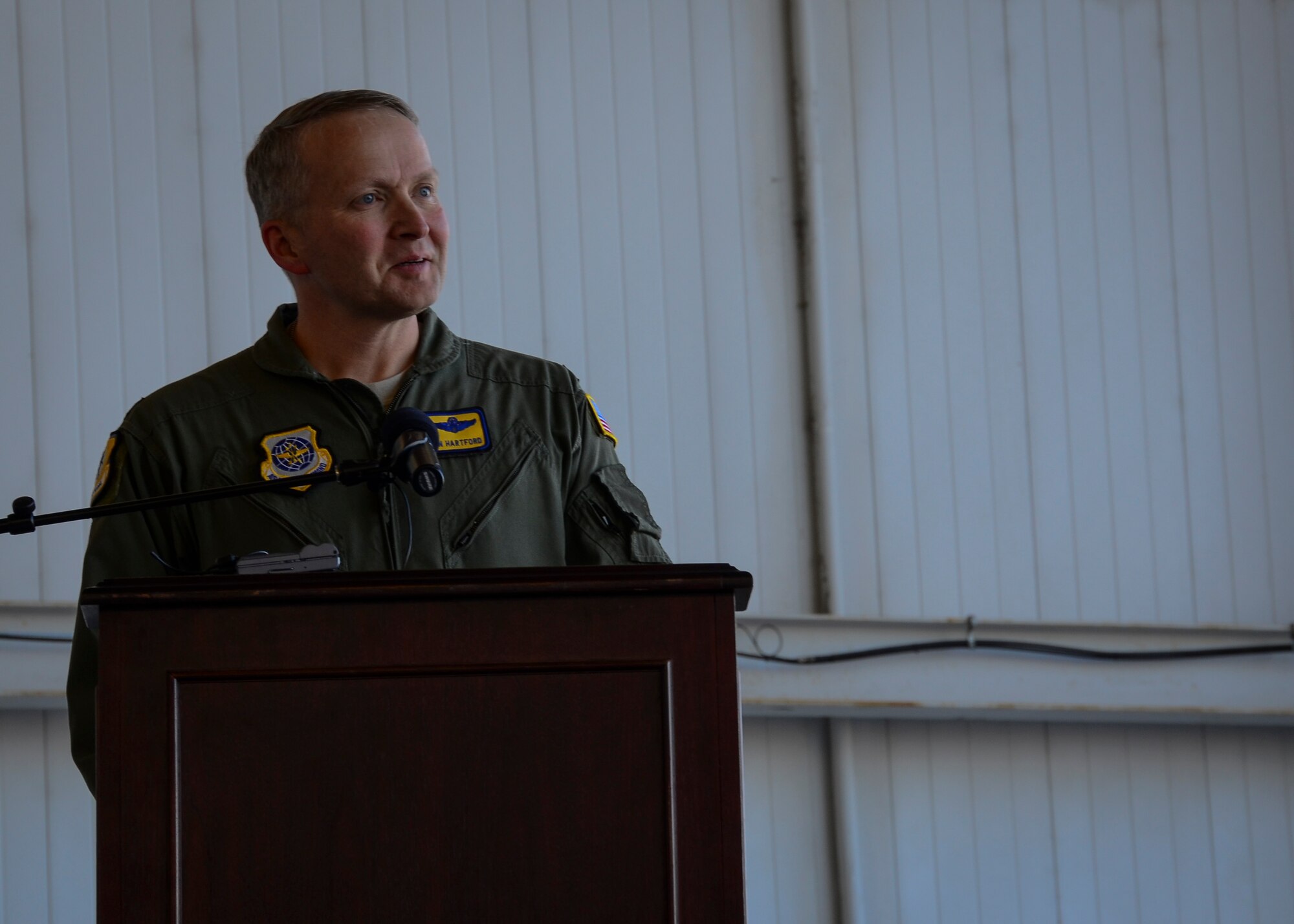 Col. Darren Hartford, 437th Airlift Wing commander, speaks during a ceremony held for Aircraft 9192’s 20,000 Flight Hours, December 18, 2013 at Joint Base Charleston – Air Base, S.C. The aircraft, nicknamed the “Spirit of Charleston” was the first C-17 in the U.S. Air Force’s inventory and has flown missions throughout the world for more than two decades. Those missions have totaled more than 20,000 flight hours. (U.S. Air Force photo/Staff Sgt. Anthony Hyatt)