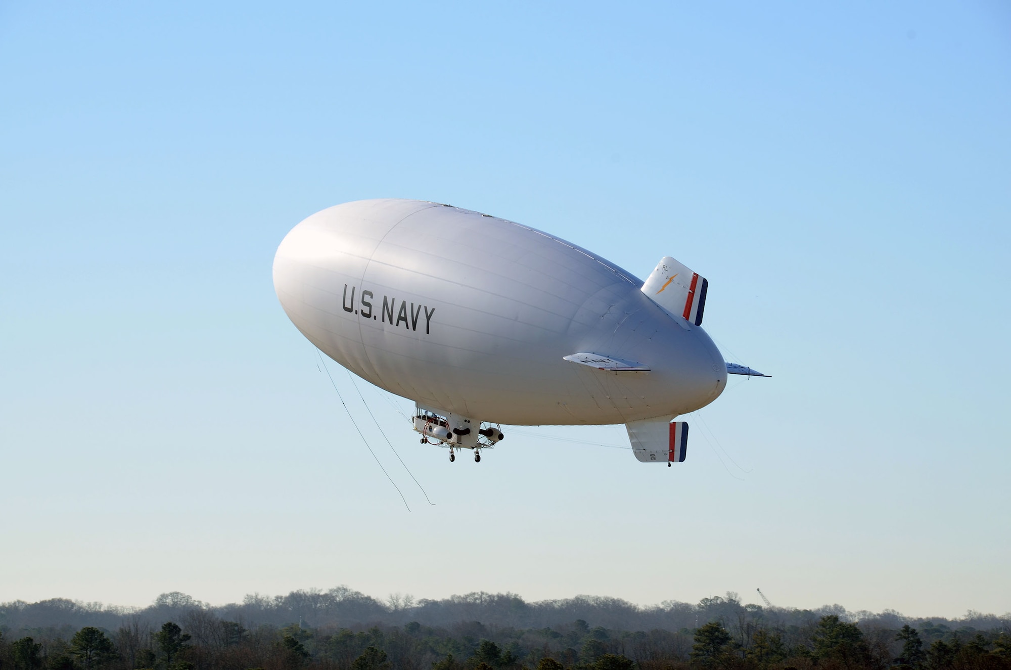 The United States Navy manned airship, MZ-3A lifts off the runway at Dobbins Air Reserve Base, Ga. Dec. 17. The Navy’s only airship based at Patuxent River, Md., stopped at Dobbins on its way to a winter location in central Florida, so that scientists from Georgia Institute of Technology Research facility could take measurements for systems integration work Dec. 14-16. (U.S. Air Force photo/Don Peek)