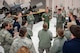 Capt. Josh Ketterer, a C-130 Hercules pilot from the 165th Airlift Squadron, talks about principles of flight with U.S. Air Force Reserve Officer Training Corps cadets during a tour of the Kentucky Air National Guard Base in Louisville, Ky., Nov. 19, 2013. The cadets are assigned to Detachment 295, which is based at the University of Louisville. (U.S. Air National Guard photo by Maj. Dale Greer)