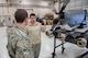 Tech. Sgt. Chuck Rodgers, an engine mechanic from the 123rd Maintenance Squadron, discusses C-130 propulsion systems with U.S. Air Force Reserve Officer Training Corps Cadet 3rd Class Trevor Johnson during a tour of the Kentucky Air National Guard Base in Louisville, Ky., Nov. 19, 2013. Johnson is assigned to Detachment 295, which is based at the University of Louisville. (U.S. Air National Guard photo by Maj. Dale Greer)