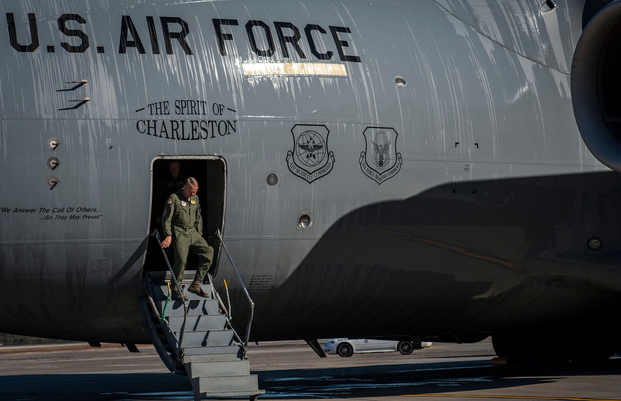 Col. Darren Hartford, 437th Airlift Wing commander, exits a C-17 Globemaster III after completing a flight Dec. 18, 2013 at Joint Base Charleston – Air Base, S.C. The aircraft, nicknamed the “Spirit of Charleston” was the first C-17 in the U.S. Air Force’s inventory and has flown missions throughout the world for more than two decades. (U.S. Air Force photo / Senior Airman Tom Brading)
