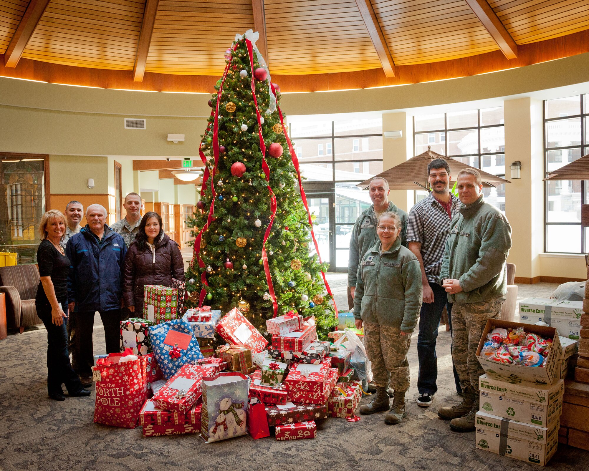 Members of the 934th Airlift Wing deliver Christmas presents for the residents at the Minneapolis Veterans Home as part of the annual Adopt-A-Vet program.  The program allows participants to "adopt" a veteran to buy gifts for during the holiday season.  (U.S. Air Force photo by Shannon McKay/Released)