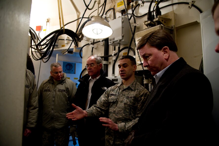 Rep. Mike Rogers, of Alabama, and Rep. Jim Cooper, of Tennessee, toured a missile alert facility prior to seeing the B-52H Stratofortress, granting them insight not only of the mission but also of the Airmen who support it. Two members of House Armed Services Committee visited Minot Air Force Base, Dec. 13-15, where they had a firsthand view of the 5th Bomb Wing and 91st Missile Wing missions in supporting two legs of the nuclear triad. (U.S. Air Force photos/Senior Airman Brittany Y. Auld)